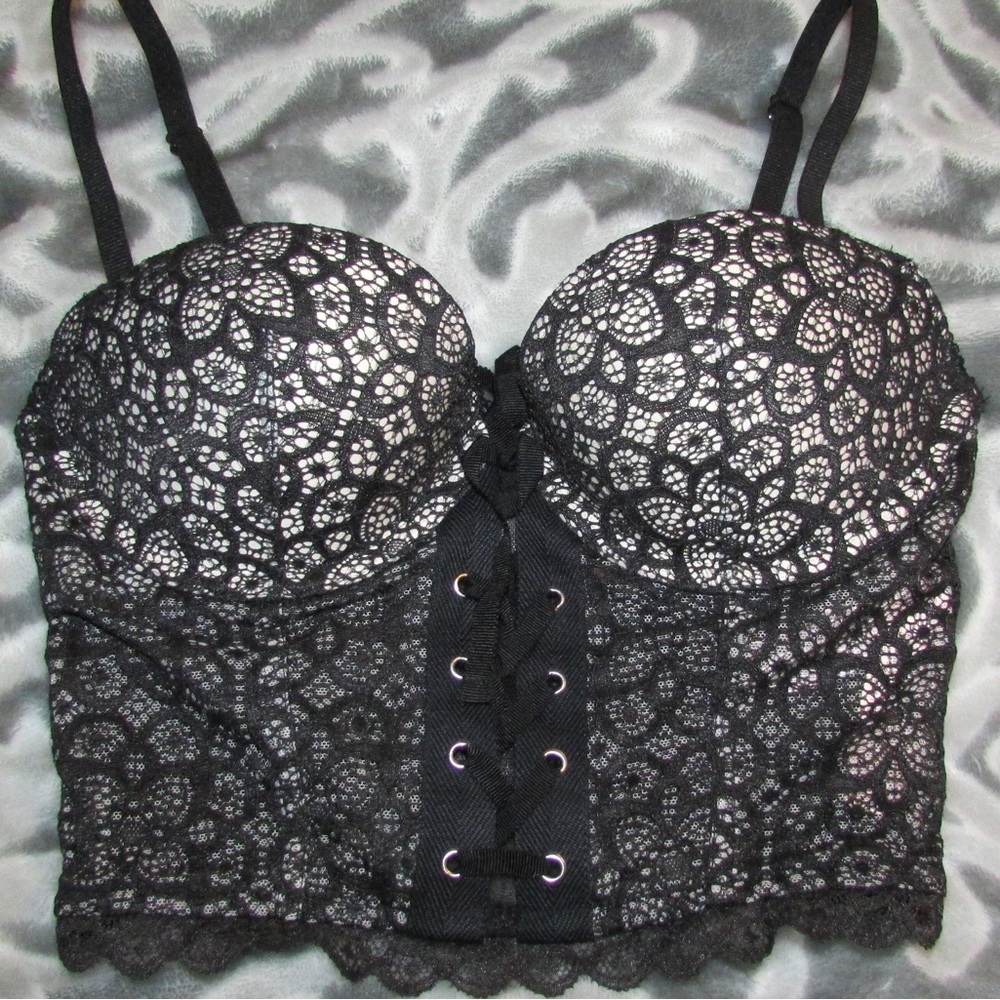 Victoria’s Secret, 32C, black lace corset bra with zipper.